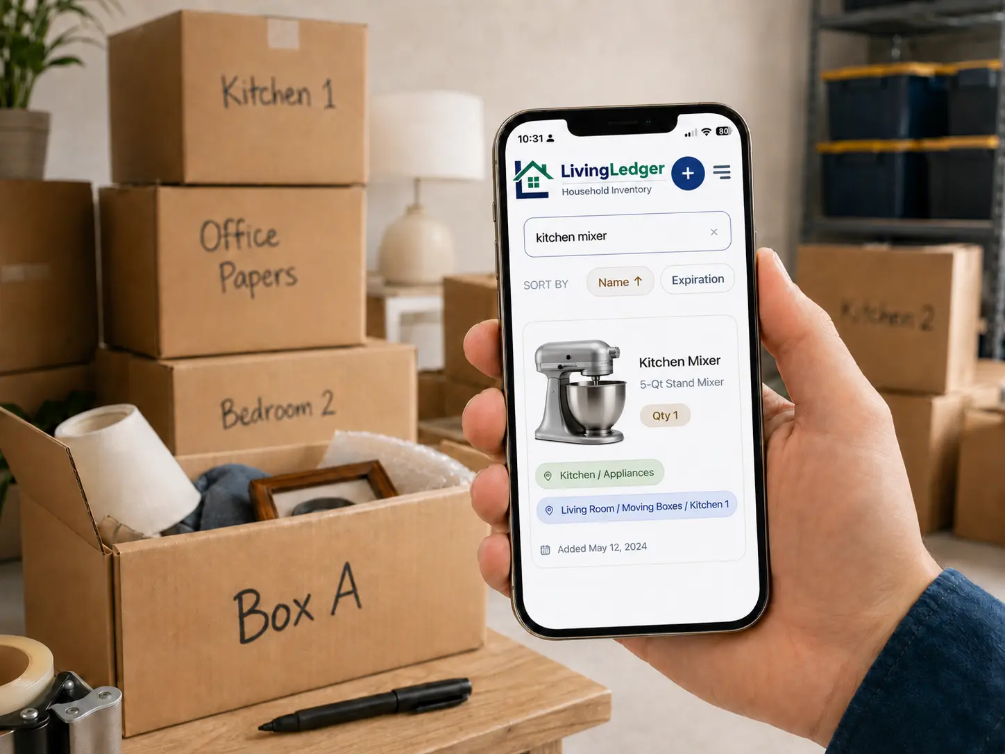 LivingLedger moving box inventory app showing a kitchen mixer saved inside a moving box